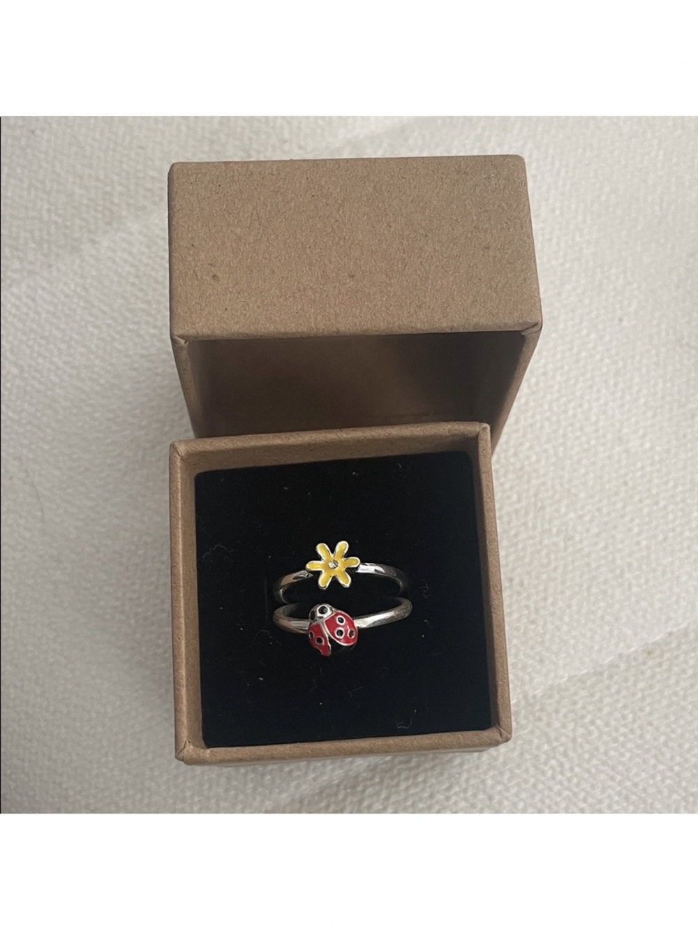 Avon Silver-Tone set of 2 Ring with Yellow Flower and Red Ladybug